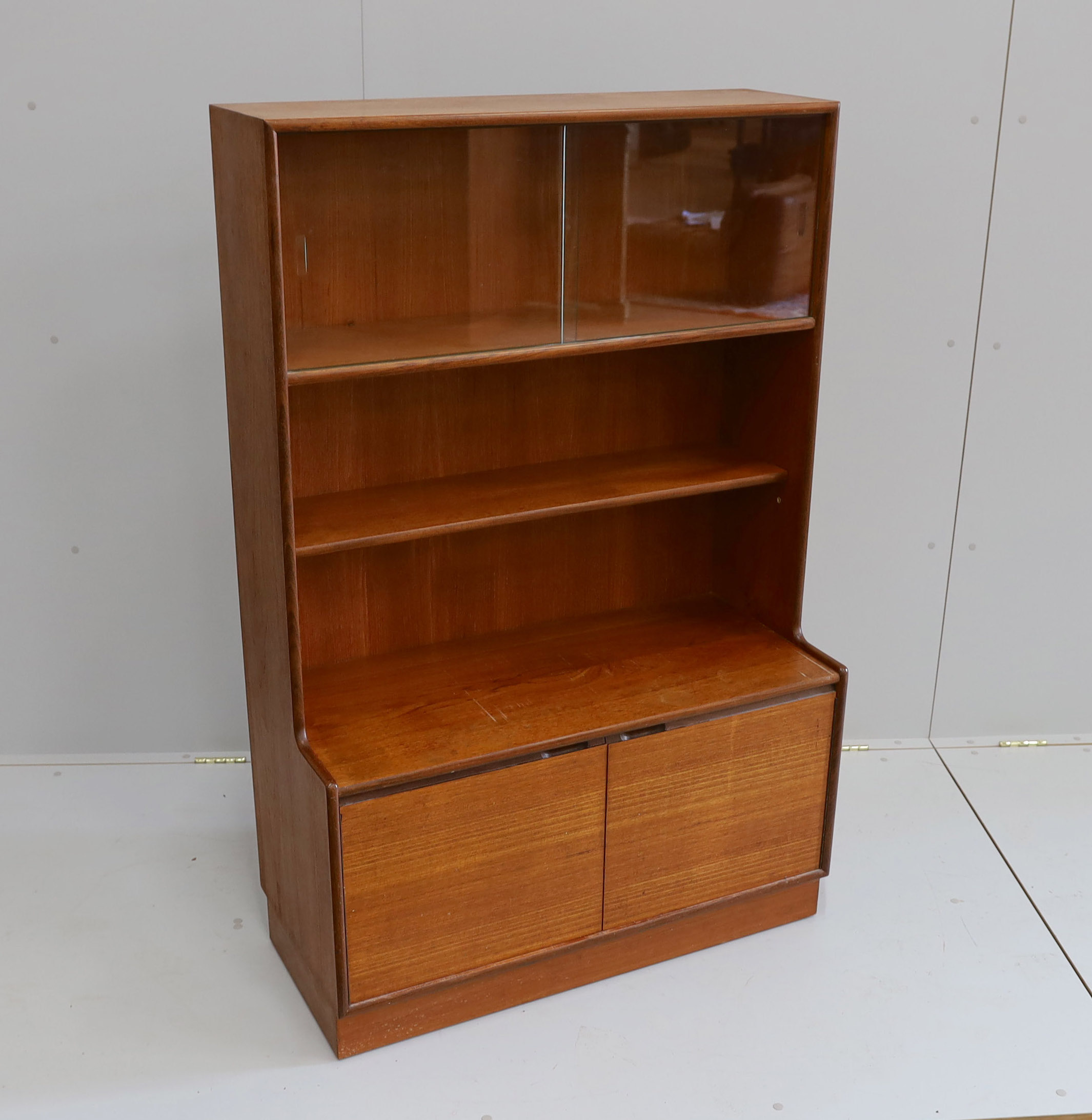 A mid century G Plan teak wall unit, width 91cm, depth 41cm, height 140cm